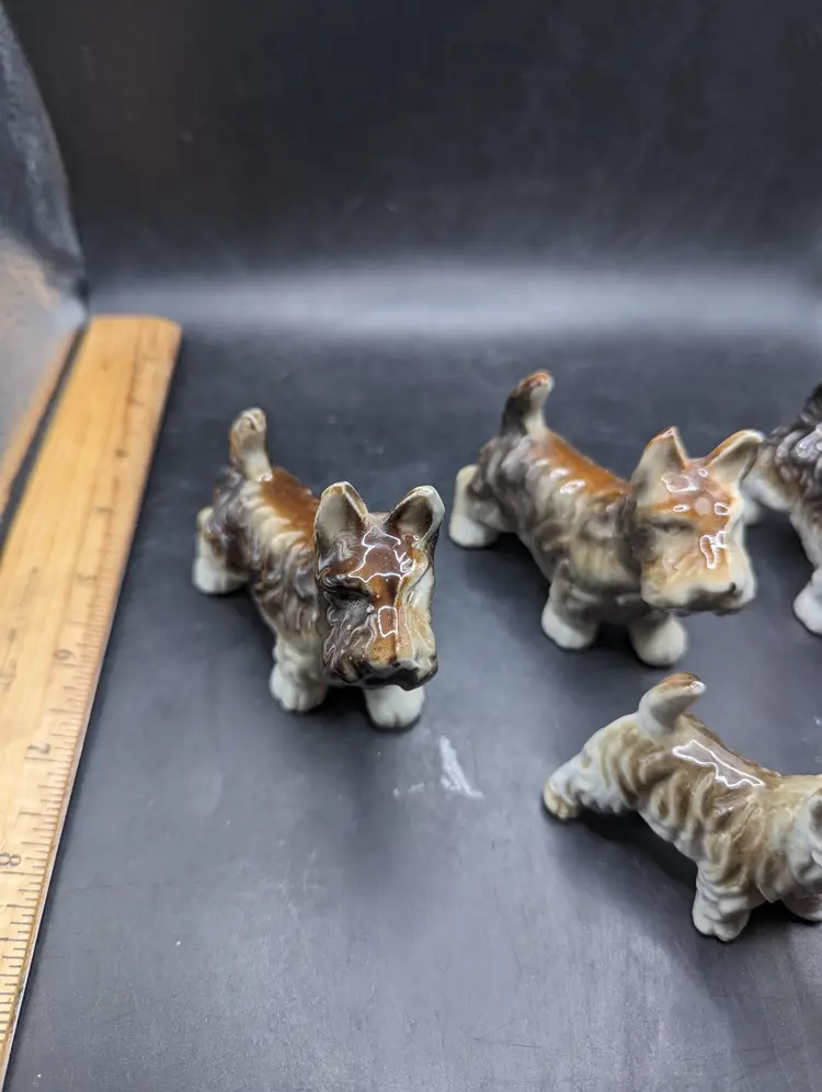Vintage Set of 4 Terrier Dog Figurines Probably Japan.