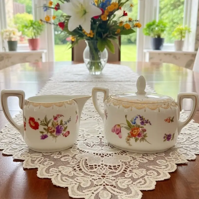 Vintage Rosenthal porcelain cream & sugar set, the Donatello pattern with gold scrolls. 4” tall 7” wide 3.5” deep