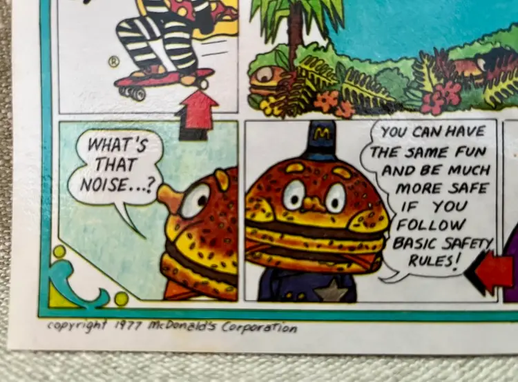 1977 Ronald McDonald Corp Activity Paper Plastic Laminate Placemat Bike Safety +