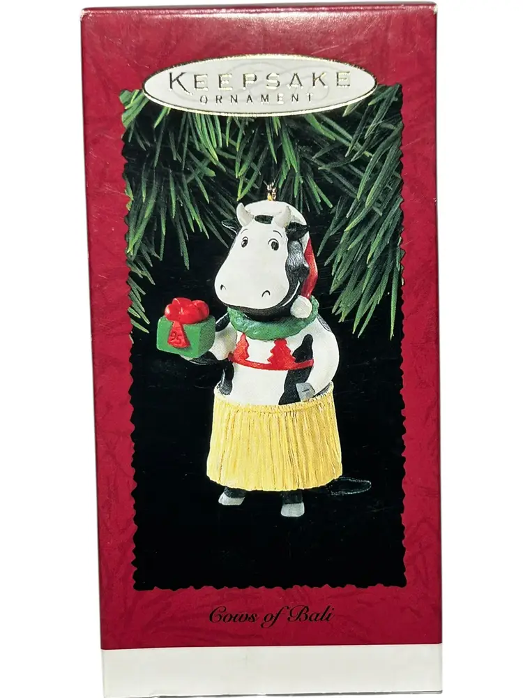 Hallmark Christmas Ornament Cows Of Bali Grass Skirt 1995