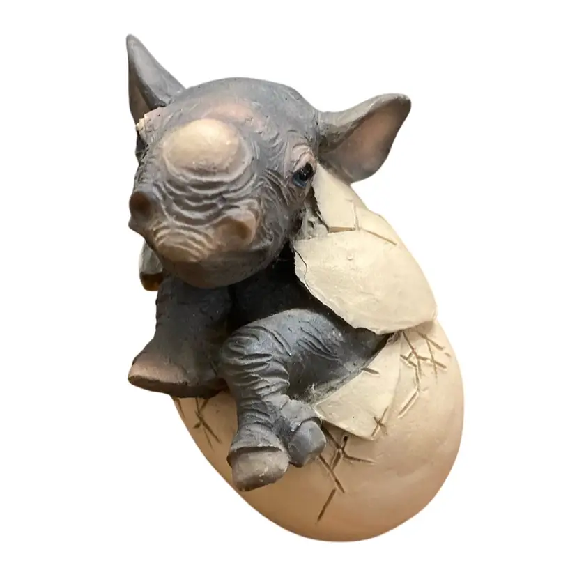 Weirdo Rhino Hatching From An Egg