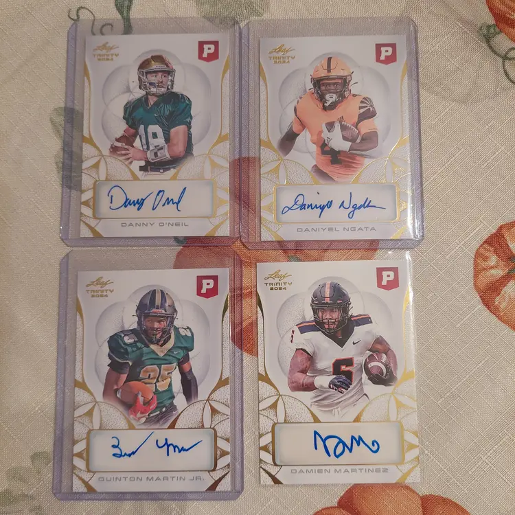 Lot of 21 college football cards. 4 auto's, 1 #'d, +. Letters M N O.