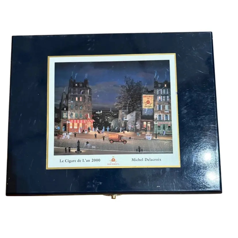 Montecristo Le Cigare de L'an 2000 cedar humidor featuring artwork by Michel Delacroix