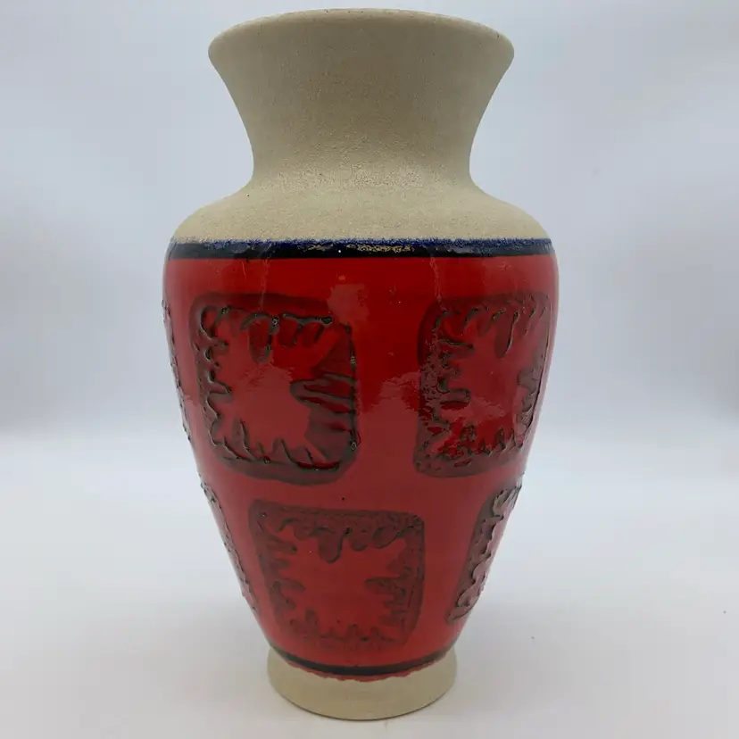 #2227 A Uebelacker ceramic vase with red relief decoration and beige upper section.