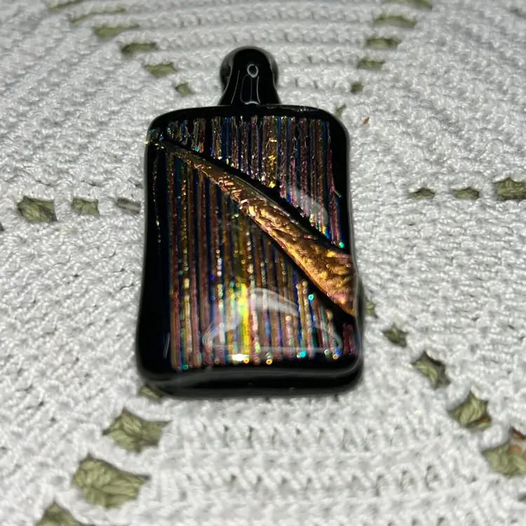 Vintage dichroic glass pendant, featuring a "colorshift" effect.