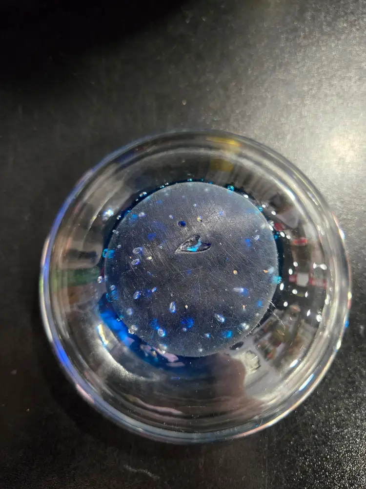 Clear glass bowl with orange fish & bubbles