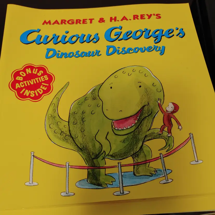 Curious George books- The Puppies and Dinosaur Discovery