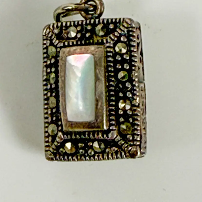 Sally C Treasures SX Sterling Silver Double sided MOP Onyx pendant