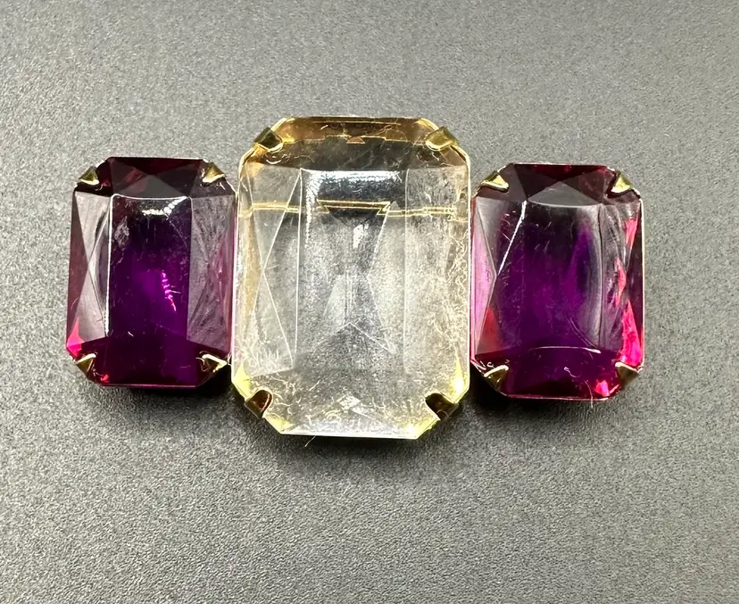 A055 - Avon Purple & Clear Rhinestone Brooch