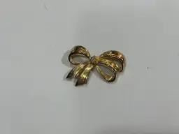 Avon Brooch Gold Tone Tied Bow Rhinestone 2.25” Signed