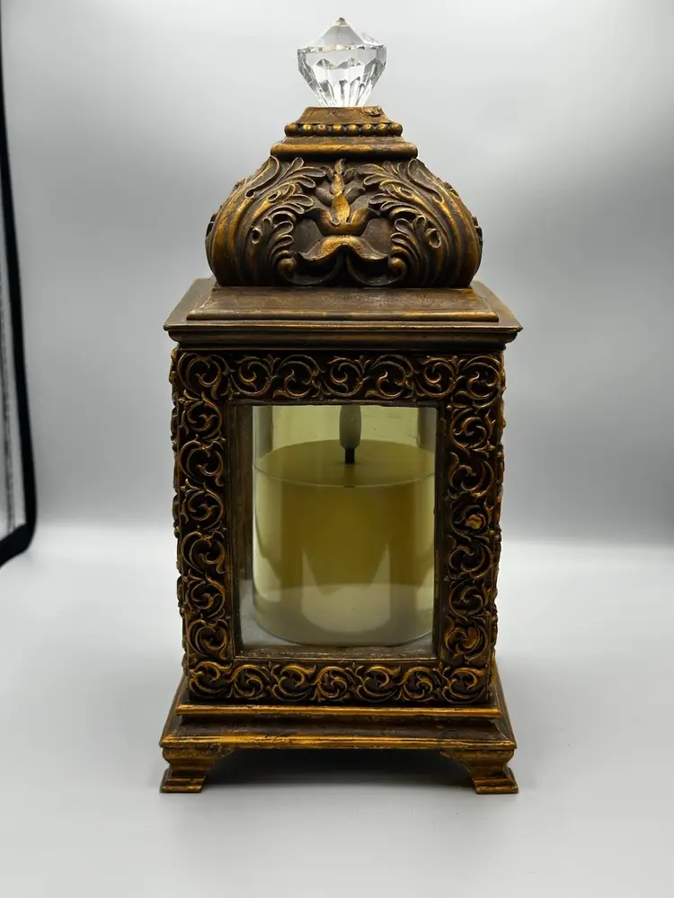 Decorative ornate gold-tone lantern