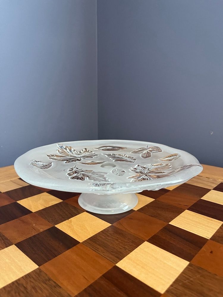Mikasa Satin Leaves glass plate Pedestal with a frosted leaf pattern.