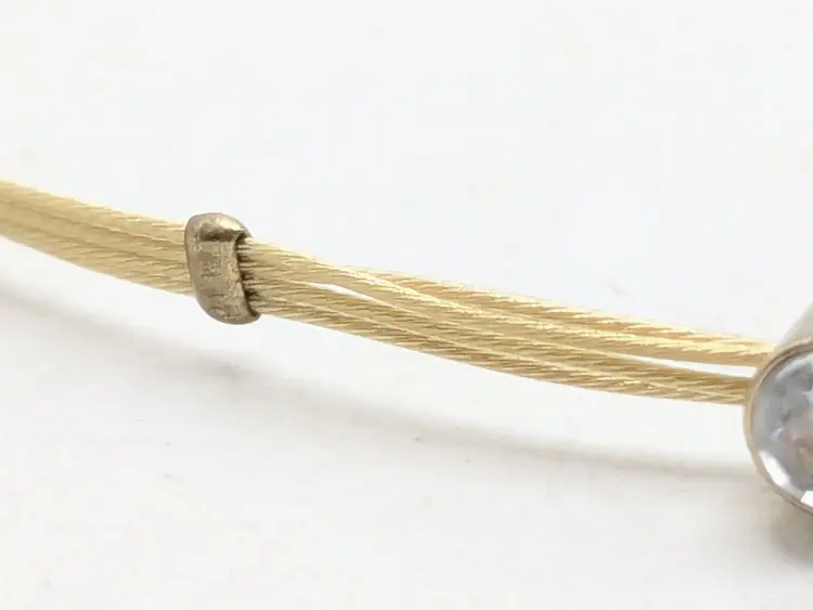 Gold Tone Guitar String Bracelet with Rhinestone Accents