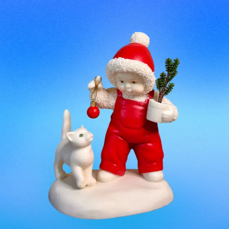 Snowbabies Figurine “Here, Kitty Kitty” 2003 Babies on the Farm Collection Department 56 Bisque Porcelain Child & Cat W/Box & Tag
5” T x 3-3/4” L x 2-3/4” W