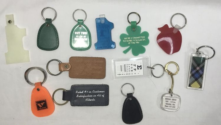 Advertising key rings, lot of 13, plastic, leather, acrylic, most from Canada