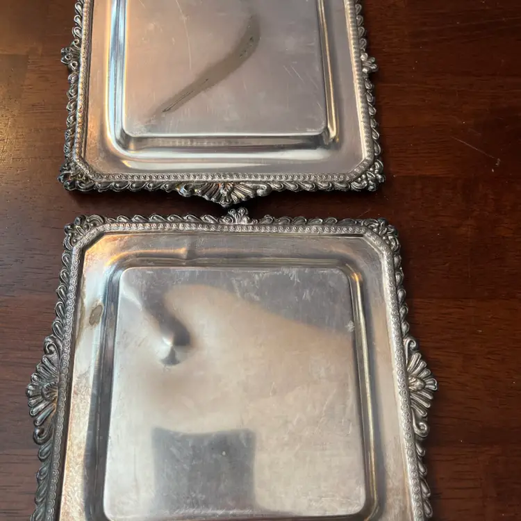 A pair of ornate, square, silver-plated decorative trays. 5.5”x5.5”
