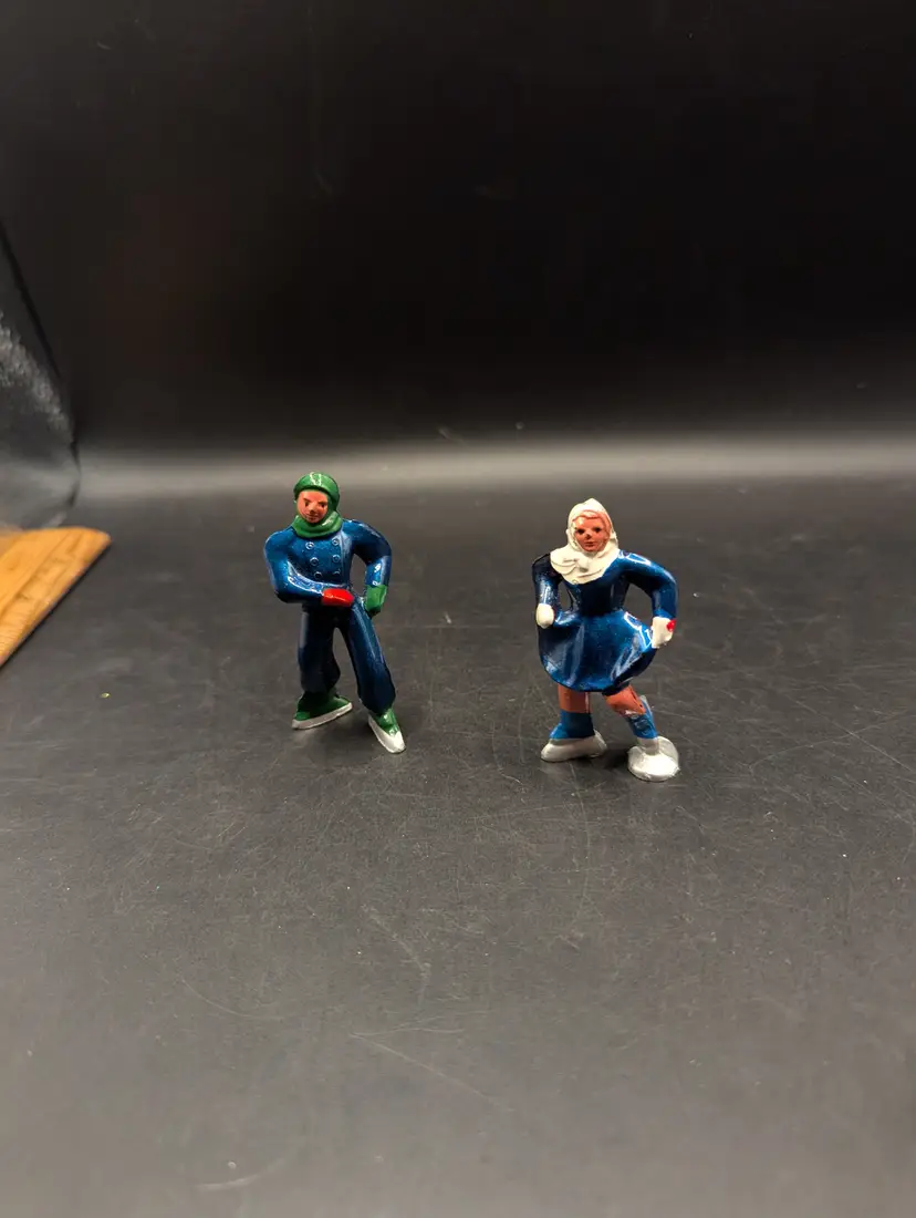 Vintage Set of 2 Barclay Type Metal Hand Painted Skaters Boy and Girl.