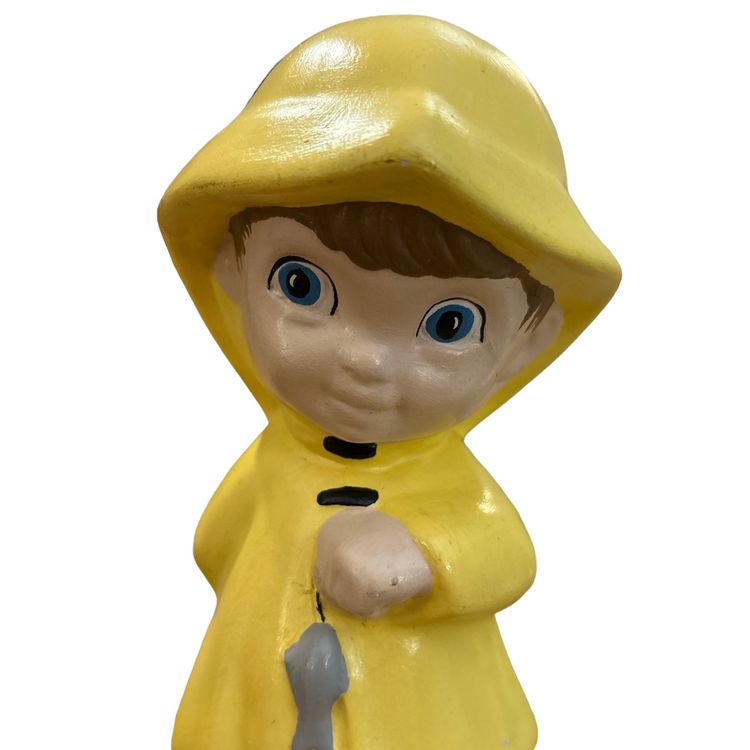 Vintage Ceramic Boy Wearing Yellow Raincoat Fishing