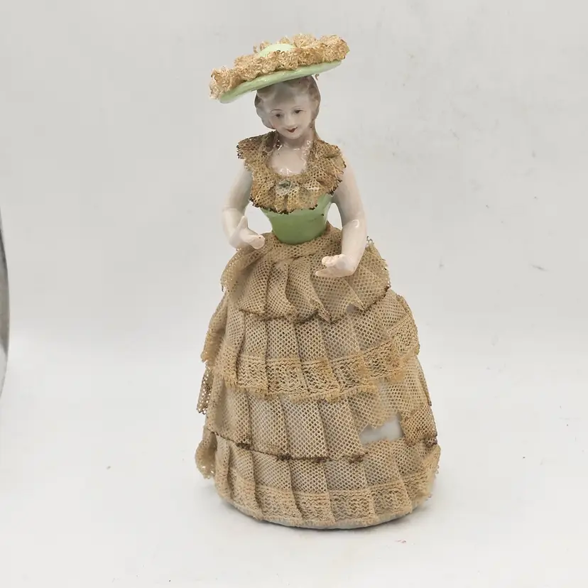 Porcelain lady Figurine Vintage with starched dress lace and hat