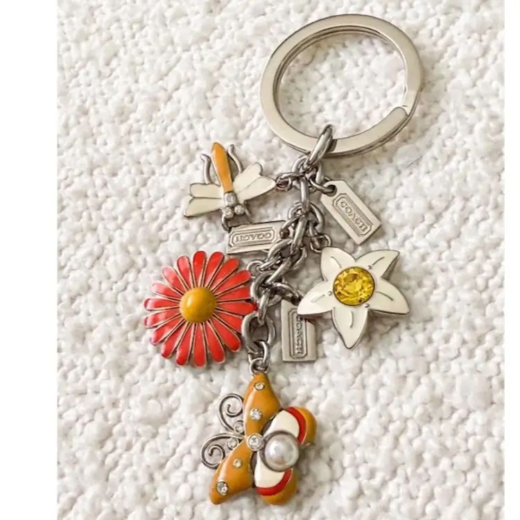 Coach Charm