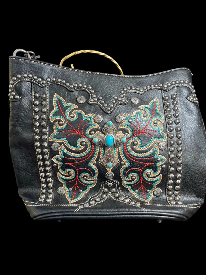 #01 Montana West Shoulder Bag w/ Brushed Silver Toned Celtic Cross w/ Faux Turquoise.  Hardware is also Brushed Silver Toned. Multi Colored Thread in a BUTTERFLY Design.