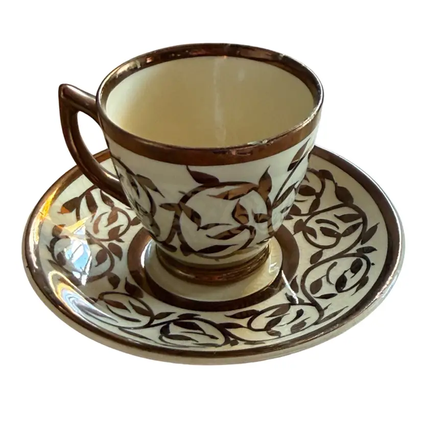 Myott, Son & Co. demitasse cup and saucer set in the "Old Lustre Ware Copper" pattern