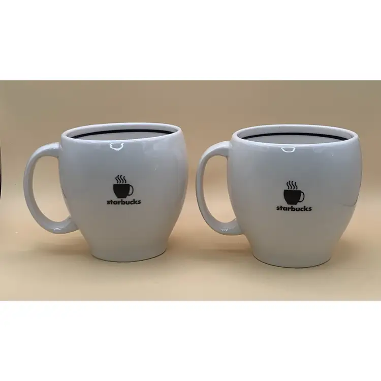 2 VTG Starbucks Abbey “Steaming Coffee Cup” Mugs 2004. 14oz. White With Black Trim And Image