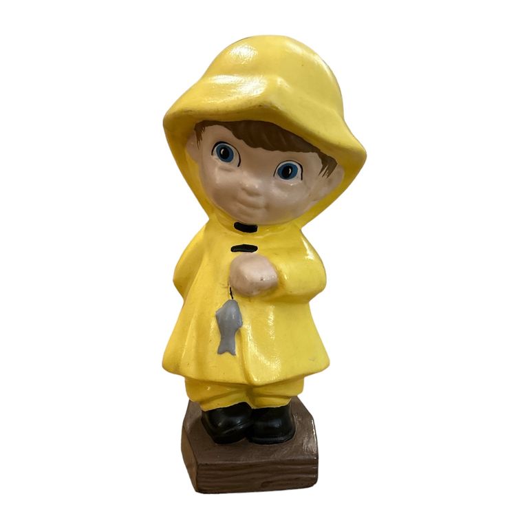 Vintage Ceramic Boy Wearing Yellow Raincoat Fishing