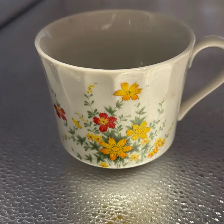 Vintage Tea Cup With A Pretty Springtime Floral Design