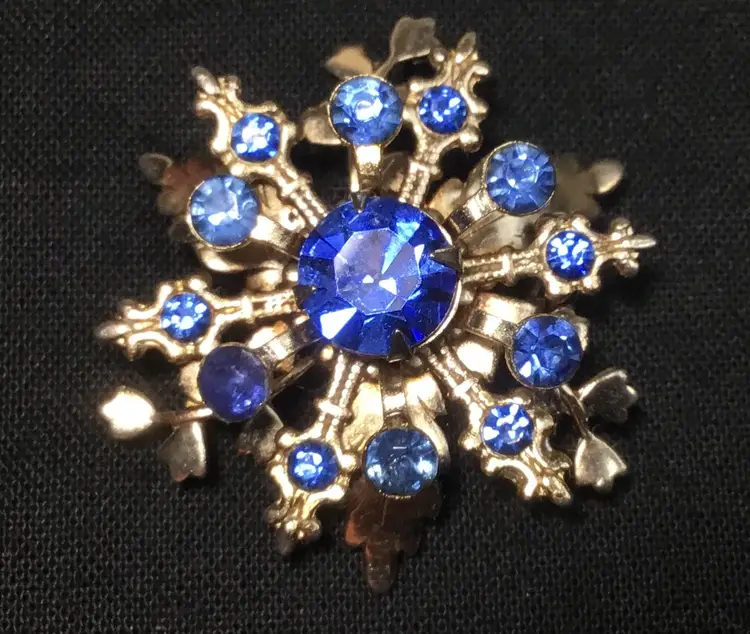 Vintage flower or snowflake brooch, small, blue rhinestones, 3 layers, 1.5" diameter