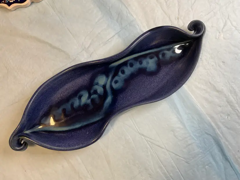 Signed Hillborn Pottery Design decorative dish in two tones of blue with beautiful curve on each end, 13” long, 4 1/2” wide, 1 1/4” tall