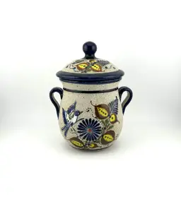 Mexican Pottery Lidded Jar With A Bird, Flowers, and Butterflies 4.75”x 3.75”x 6.25”