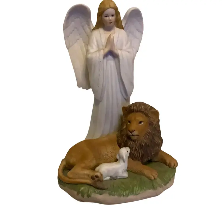 72.  Beautiful 7” Tall Home Interiors "Peace on Earth" porcelain figurine depicting an angel with a lion and a lamb