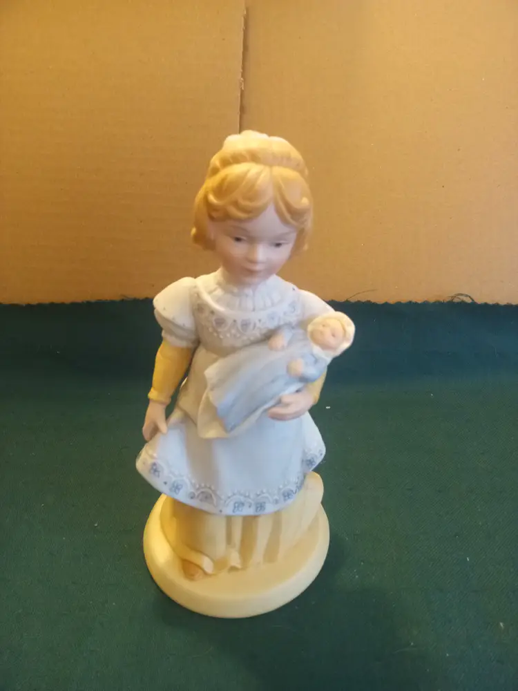 Avon's "A mother's love" porcelain doll