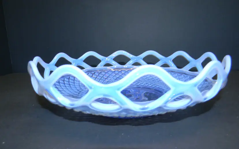 Imperial Glass with lace edge Opalescent katy blue glass bowl also glows purple around the lace ( 7 1/2" W x 2 1/2" H)