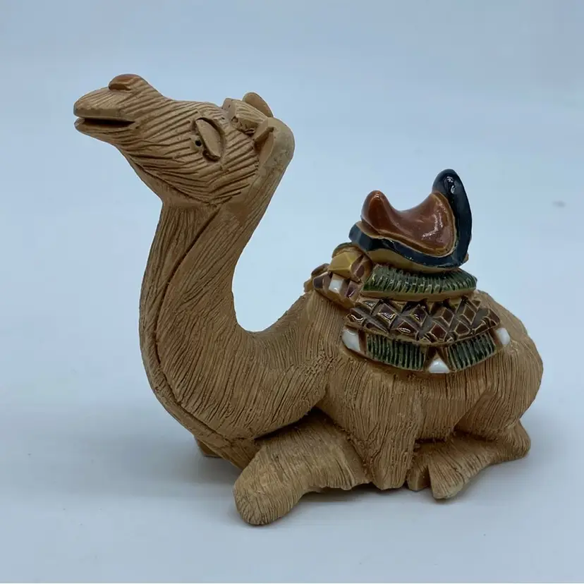 #3005 Handcrafted Artesania Rinconada ceramic camel figurine with painted details.
