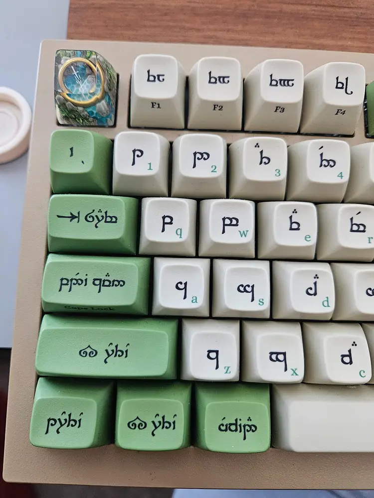 LOTR modded Keychron Q1 and custom brass plate, resin knob, Delete key, and Escape key