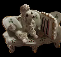 Porcelain Spaghetti Poodle Figurine On A Couch (Japanese)