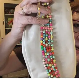 Gold Bag And Necklace