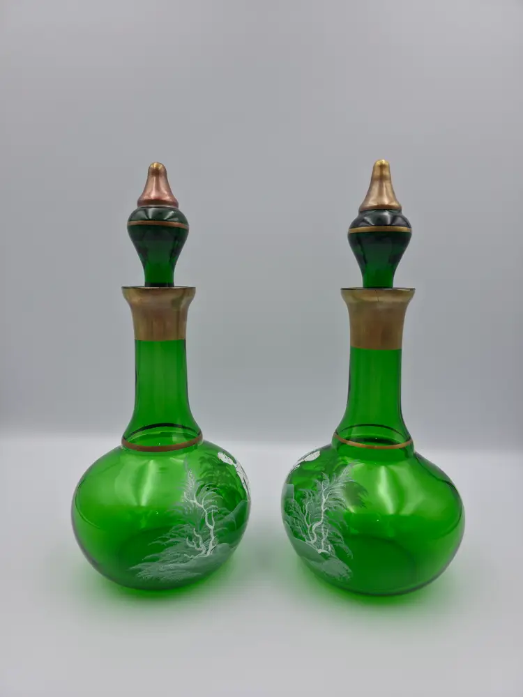 Pair of Mary Gregory Painted Green Glass Decanters with Gold Trim