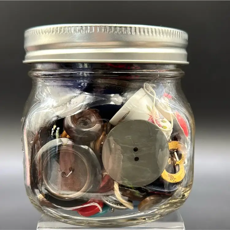 A jar of vintage buttons