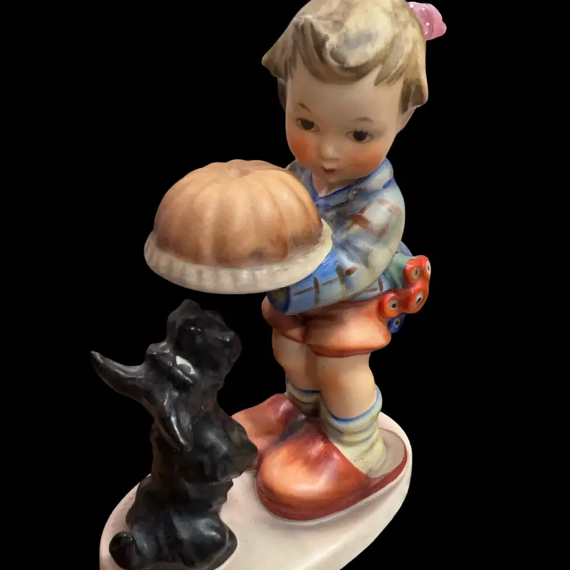 Goebel Hummel "Begging His Share" figurine featuring a boy and a dog.stamp On Bottom