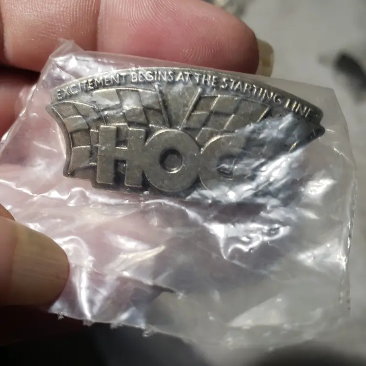 HARLEY OWNERS GROUP HOG " EXCITEMENT BEGINS AT THE STARTING LINE" SILVER PIN