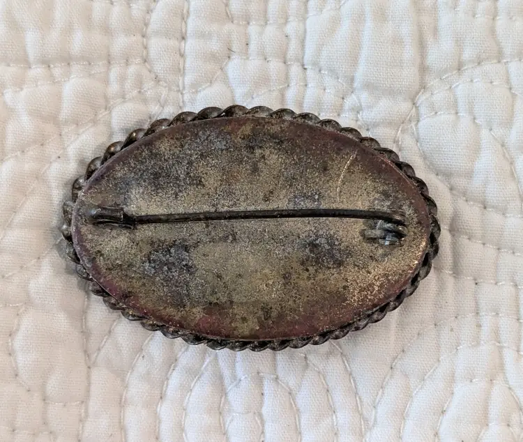 Large Vintage Oval Floral Italian Micromosaic Brooch with Raised Flowers on a Black Background