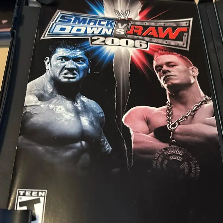 PS2 Complete In Case- WWE Smackdown vs Raw 2006 - Resurfaced