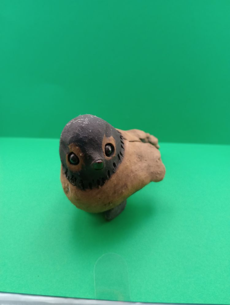 Earthenware studio pottery bird, signed