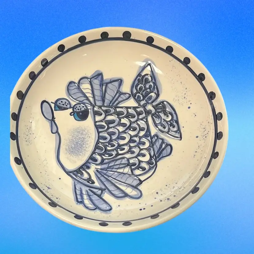 This is a Diane Artware fish platter.