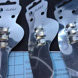 3 sets of 3 toe rings.