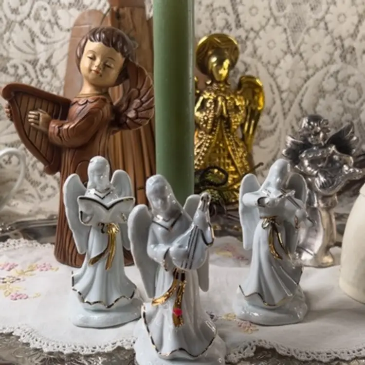 Three White Angel Candlestick Holders
