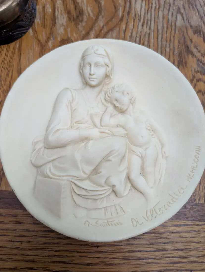 Alabaster collector's plate depicts the Madonna and Child